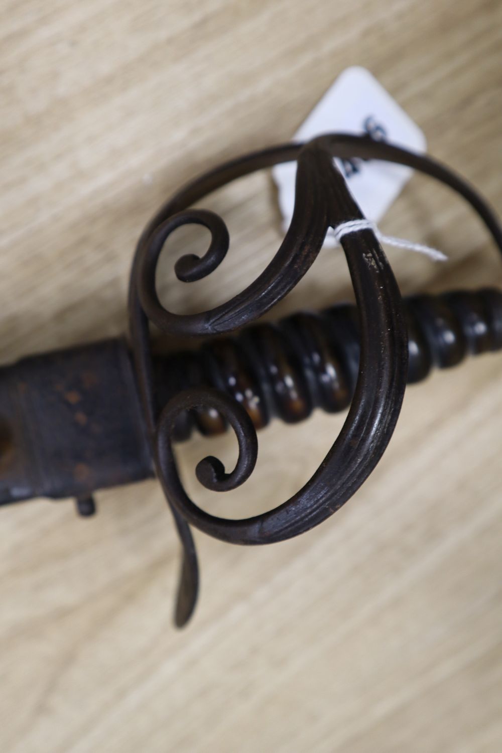 A 17th century English dress sword with fullered blade, leather scabbard, 99cm (the latter a.f.)